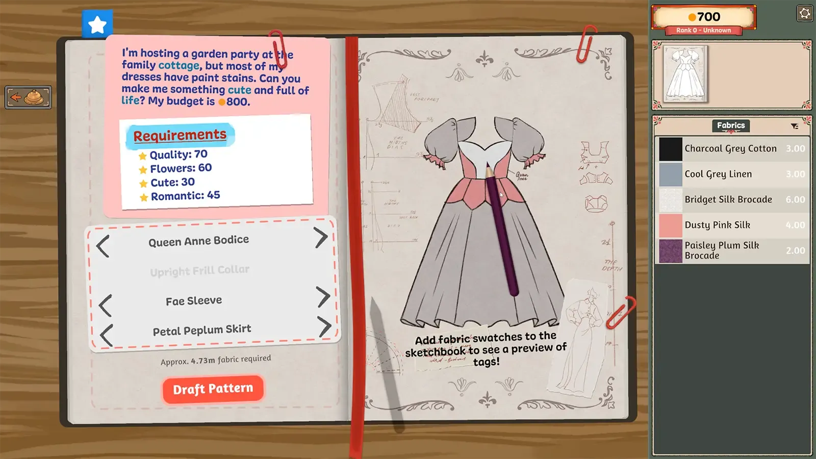 Pattern pieces laid out on the brief and cutting table inside the game