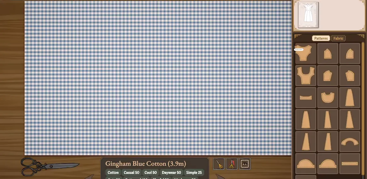 Gingham blue cotton bolt with the pattern grid and the ON GRAIN tag